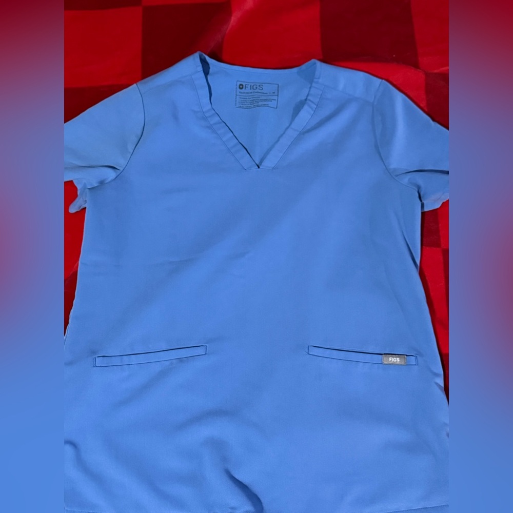 Women's Ceil Blue Casma™ - Three-Pocket Scrub Top
M - Ceil Blue - Regular
